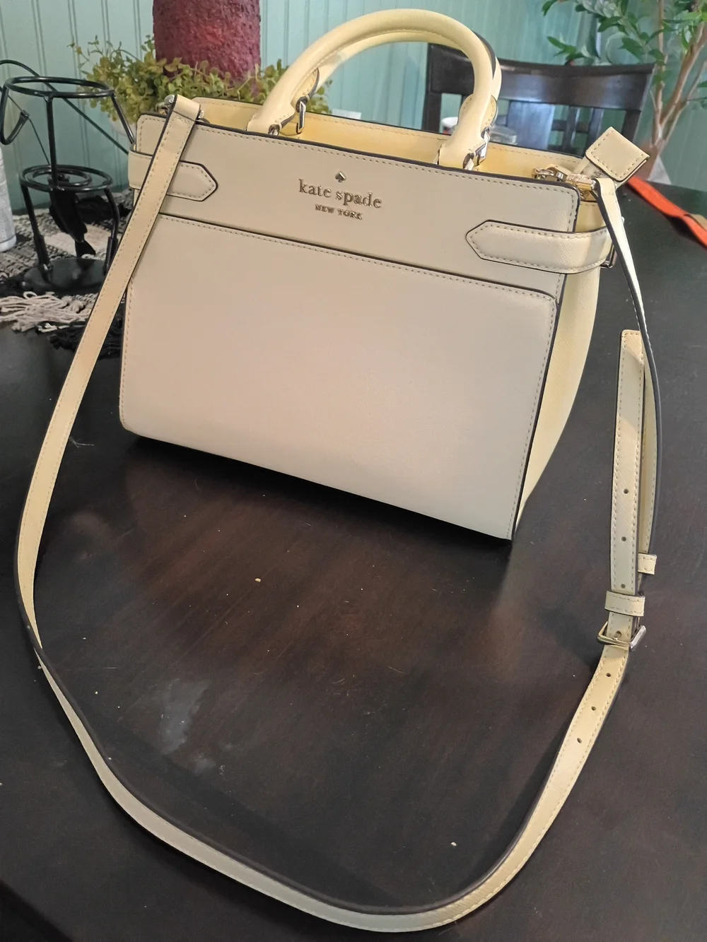 Kate Spade Staci Medium Satchel in a light yellow colorway.